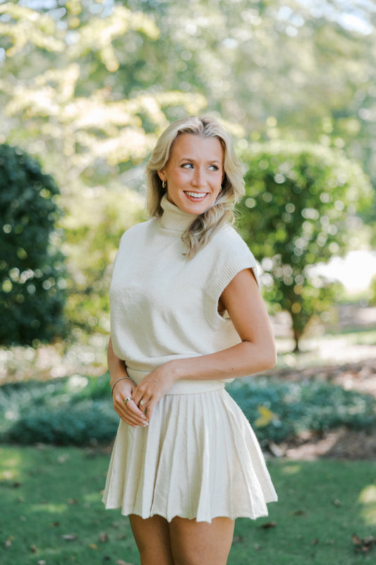 Cream Turtleneck Crop Top and Pleated Skirt Set