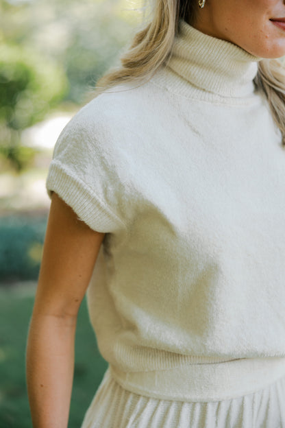 Cream Turtleneck Crop Top and Pleated Skirt Set