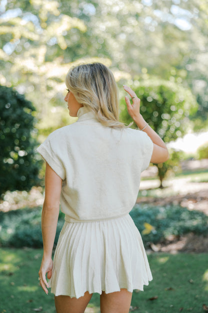 Cream Turtleneck Crop Top and Pleated Skirt Set