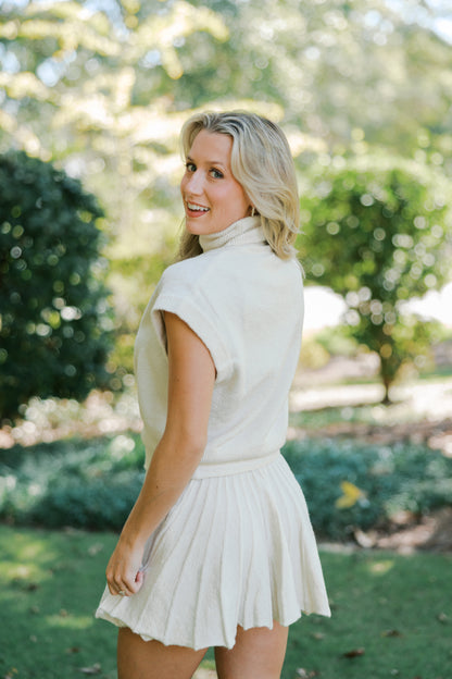 Cream Turtleneck Crop Top and Pleated Skirt Set