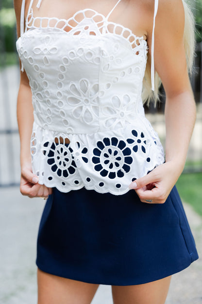 Embroidered Eyelet Peplum Top