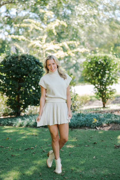 Cream Turtleneck Crop Top and Pleated Skirt Set