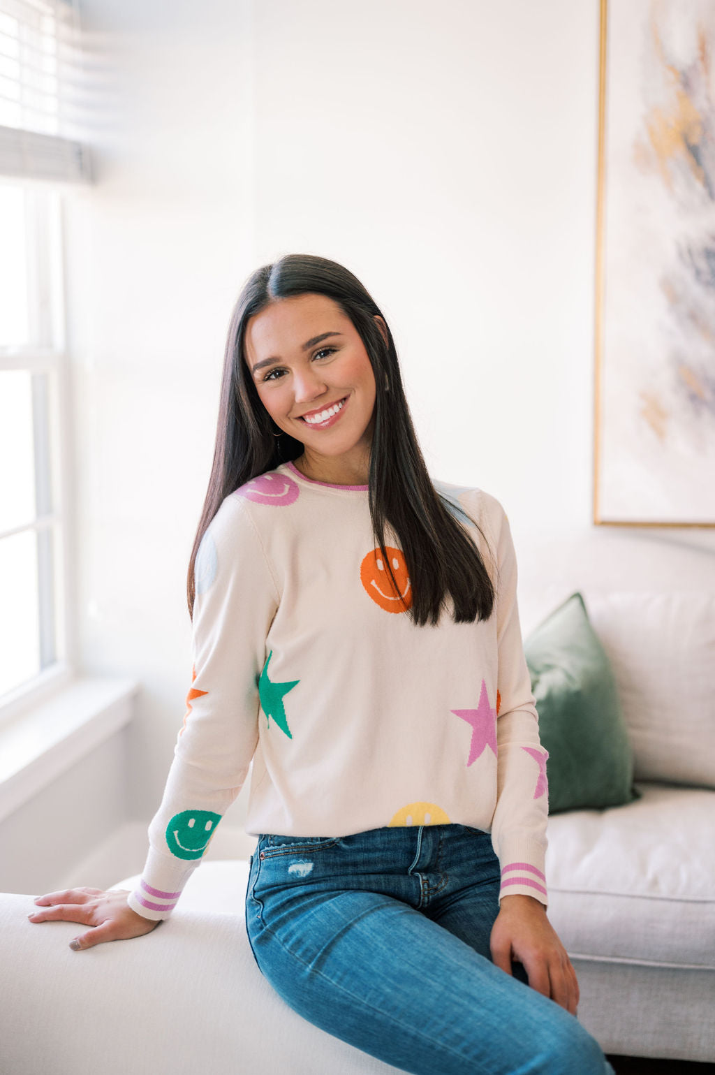 SMILEY FACE AND STAR PRINT SWEATER