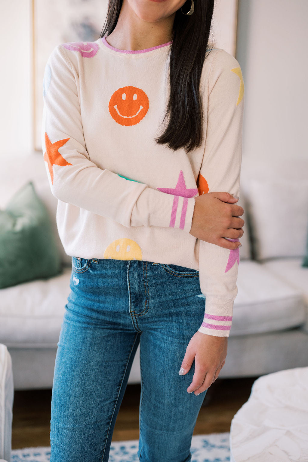 SMILEY FACE AND STAR PRINT SWEATER